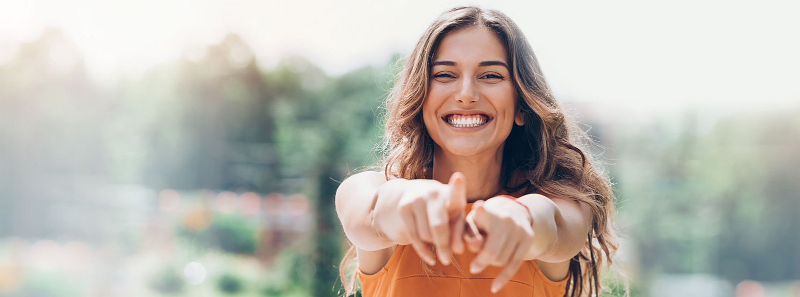 Person smiling and pointing.