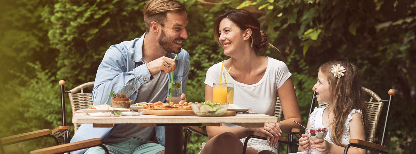Family eating outdoors.