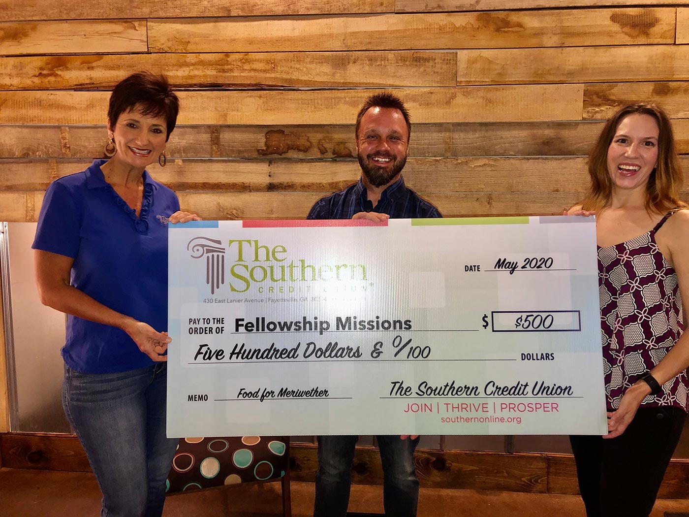 Southern Credit Union presenting a check to the Fellowship Missions