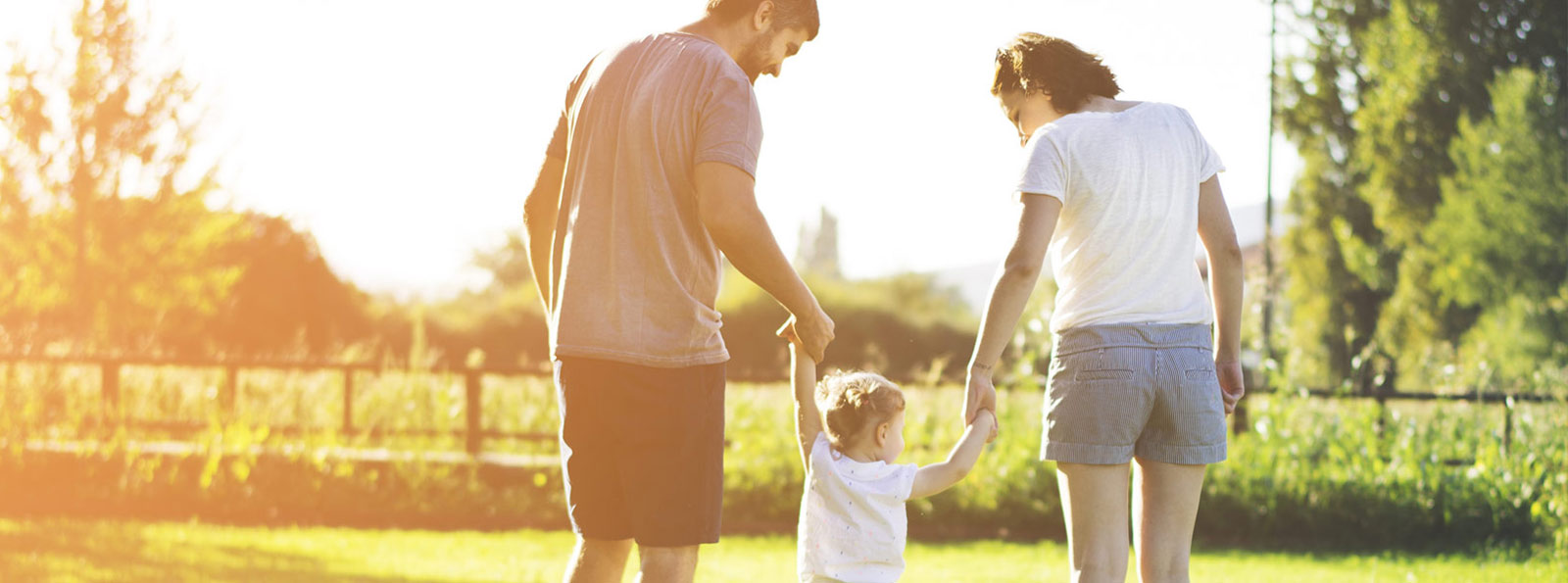 Family walking outdoors.
