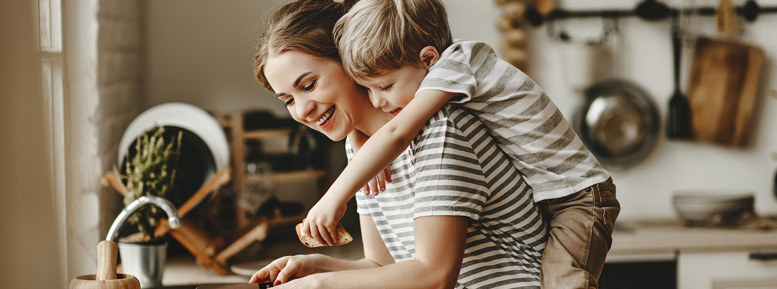 Child on his mother's back.