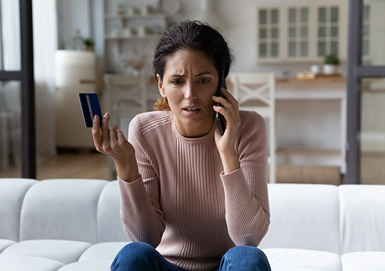 Worried woman on the phone
