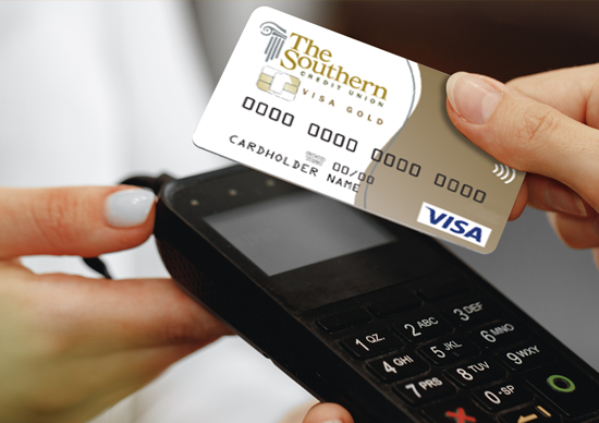 Person paying with their contactless debit card